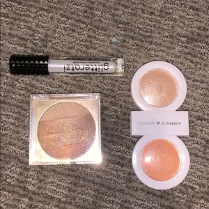 make up kit. highlighters and lip gloss.